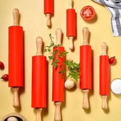 China Viable Factory Wholesale Pastry Kneading Tools Rolling Pin Silicone Rolling Pin With Wooden Handle For Baking for sale