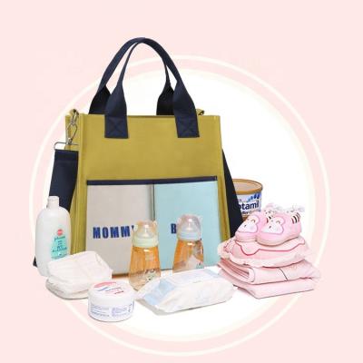 China Large Water Resistant Travel Diaper Tote Bag Baby Carriage Hanging Bag with Insulated Pocket for Mom Dad for sale