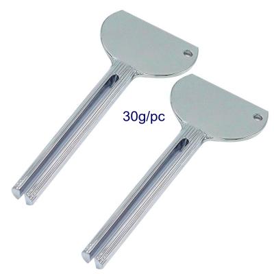 China Viable Bathroom Hair Salon Accessories Metal Tube Toothpaste Squeezer for sale