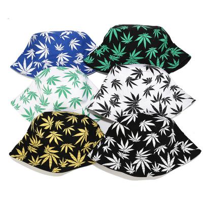 China Custom Hot Selling Sungnan Capcotton Leaf Print Reversible Bucket Fishing Hat for sale