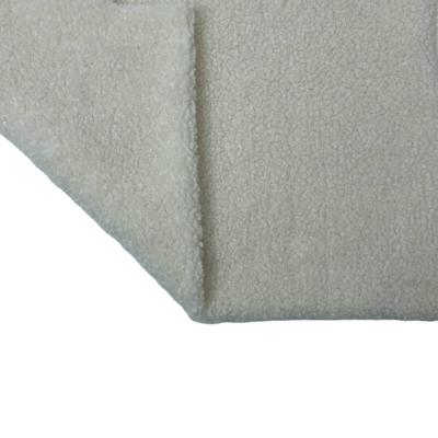 China Changshu City Baoyujia Batch Piel Durazno Para Coral Nios Tear-Resistant Fleece Teddy Fabric In Ivory White Color for sale