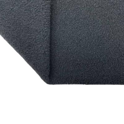 China Tear-resistant chinese tela plush fabrics for clothing in black color for sale