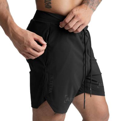 China Summer Sustainable Mens Sports Shorts Straight Tube Raincoat Quick Dry Running Fitness Shorts Mens Shorts for sale