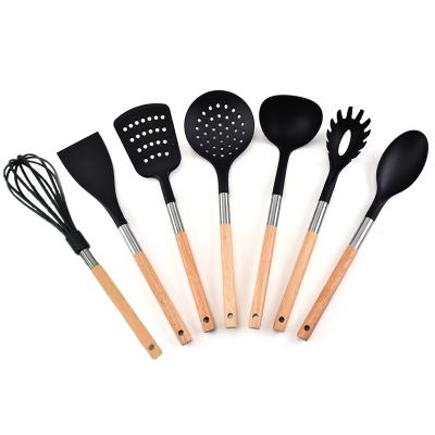 China Unique Sustainable Home Kitchen Tools 7 Pieces Holding Cookware Set With Wooden Handle for sale