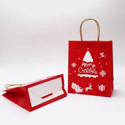 China High Quality Christmas Theme Gift Red Paper Shopping Bag With Handle For Christmas Candy Gifts Greeting Packaging for sale