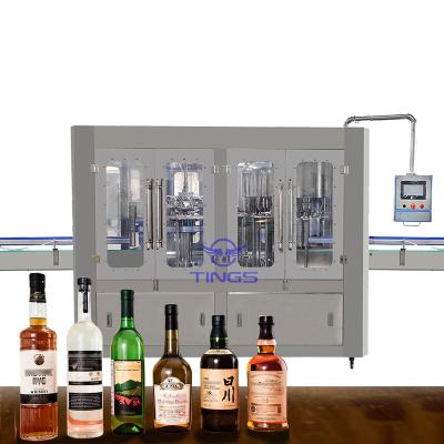 China Automatic Glass Bottle vodka Gins whiskey rinsing filling capping machine bottling equipmet en venta