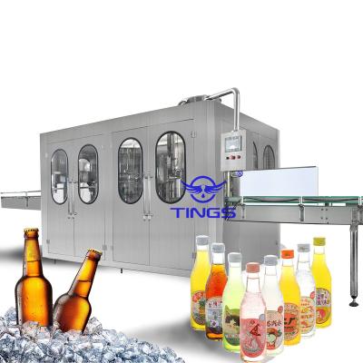 China Commercial automatic Glass Bottle liquid filling machine en venta