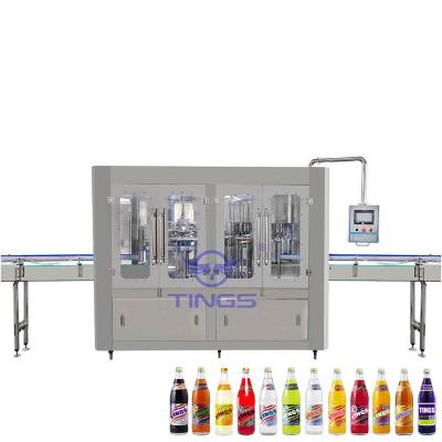 China Commercial automatic Glass Bottle CSD Soft Drinks washing filling capping machine bottling equipmet en venta