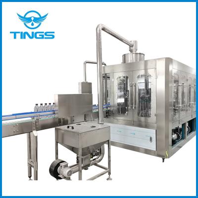 Cina small scale automatic rotary bottle liquid filling machine with washing filling and capping function in vendita