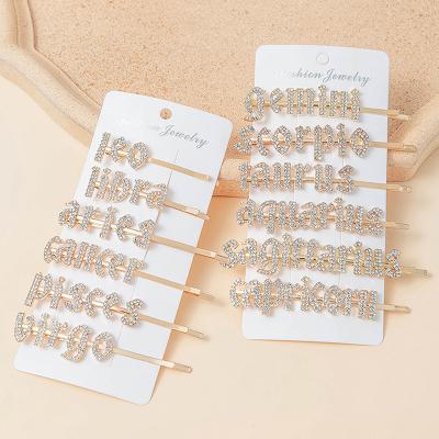 China Fashionable Custom 12 Zodiac Gold Plated Name Hair Pin Rhinestone Initial Letter Crystal Hair Clip for sale