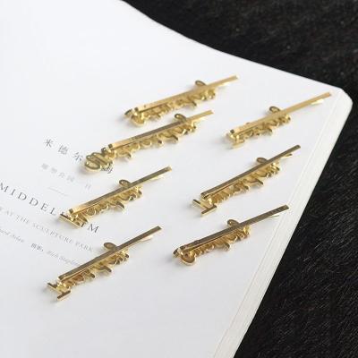 China Metal clip side hairpin hair accessories simple fashion letter wholesale trendy Monday-Sunday for sale