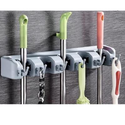 China Commercial Wall Mounted Viable Broom Mop Holder Garden Tools Organizer Saving Space Storage Holder for Kitchen and Garage Laundry for sale