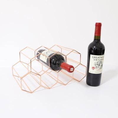 China CLASSIC simple and modern gold creative double-layer wrought iron wine rack bar wine rack wine cabinet ornaments for sale