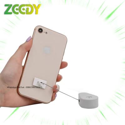 China Earphone Retail Store Mobile Phone Theft Recoiler Display Stand Anti Sell Security Cable Retractable Access Box for sale