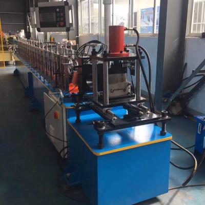 China Full Automatic Galvanized Hotels Metal Rolling Shutter Door Bottom Rail Roll Forming Machine for sale