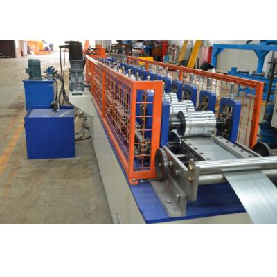 China Popular Type Hotels CE Certificated America 125mm Width Perforated Rolling Shutter Slat Door Making Roll Forming Machine for sale