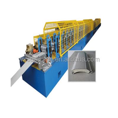 China Hotels 2 Ton Un-coiler PU Insulated Door Double Key Shutters Forming Machine for sale