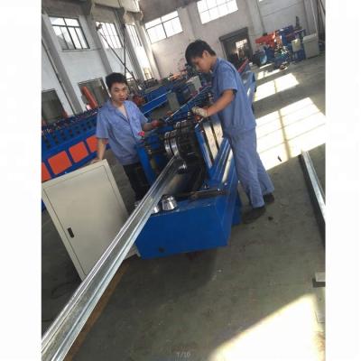 China 0.7-1.2mm galvanized steel high speed door bottom machine for rolling shutter for sale