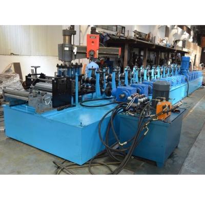 China Building Material Stores 10-12m/Min Gearbox Drive Hydraulic Cutting C Purlin Cold Roll Forming Machine for sale