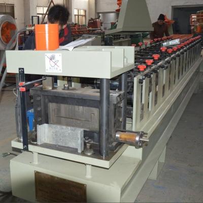 China Hotels 1mm Thickness Metal Floor Tiles Roll Forming Machine Floor Deck Roll Forming Machine for sale