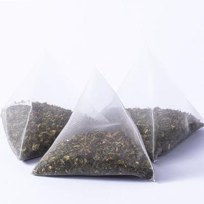 China Biodegradable Triangle Bag Tea Blossom and Fruit Tea Peach Oolong Tea Sweet Flavoring Tea Bags DTF02 for sale