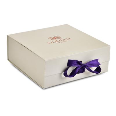 China Recycled Materials Folding Box Customized Women's Clothing Packaging With Ribbon Magnetic Foldable Gift Box for sale