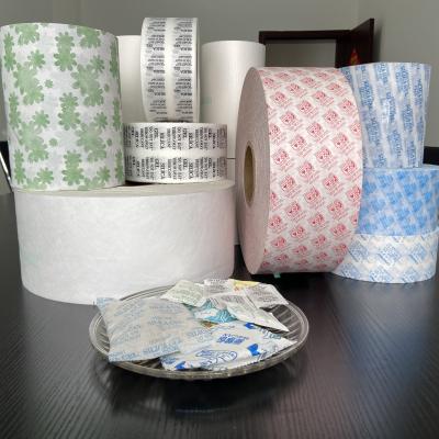 China Raincoat ; Moisture proof; Printing desiccant manufacture and kraft paper supplier for silica gel sachet dryer bag for sale