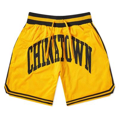 China Patch Custom Embroidery Antibacterial Mens Basketball Shorts Logo Mesh Quick Dry Basketball Shorts With Pockets for sale