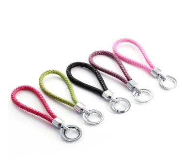 China New creative gift product pu leather woven metal keychain keyrings for sale