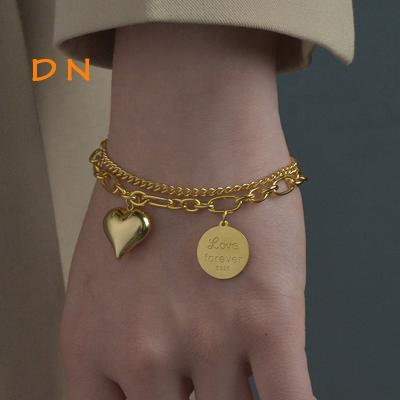 China Dina Hot Selling Fashion TRENDY Vintage 18K Gold Plated Double Layer Chain Heart Charms Bracelet Jewelry Volume With Round Disc for sale