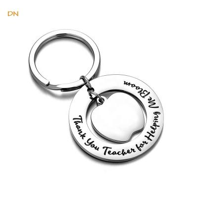 China Stainless Steel Dina Teacher's Day Apple Gift Charms Custom Engraved Letters Stainless Steel Key Chain for sale