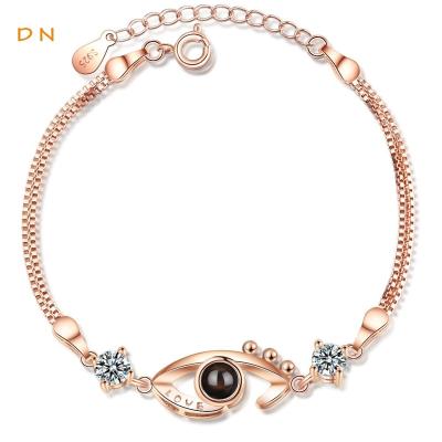 China Dina Fashion Women Simple Style Cute Copper Zircon Projection Crystal Evil Eye Charm Bracelets & Bangles Tongue Chain Jewelry 100 for sale