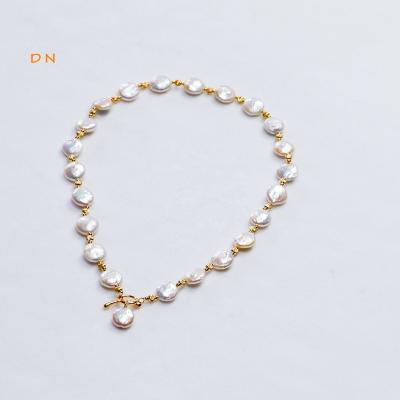 China Dina Trendy Top Quality Woman Casual/Sporty Round 12mm Irregular Baroque Flat Pearl Choker Necklace With 14K Gold Plated Accessories for sale