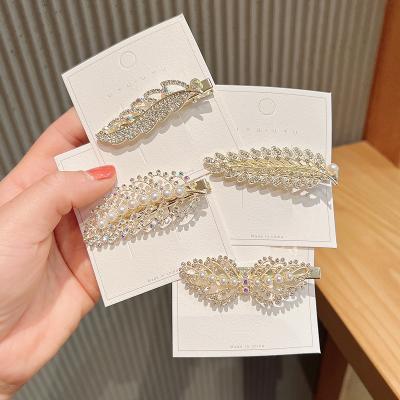 China Simple Soft Rhinestone Crystal Diamond Side Clip Alloy Pearl Bow Hair Pin for sale