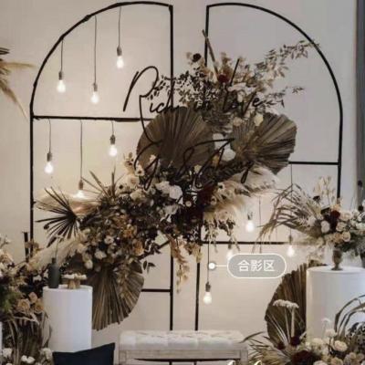 China New Wedding Easily Assembled Wrought Iron Props Decorate Wedding Stage Supply Items Screen Arch Black Background for sale