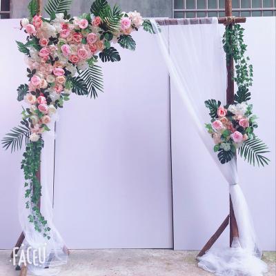 China New easily assembled lawn wedding props arch wooden furnishing items wedding flower door stub bottom layout for sale