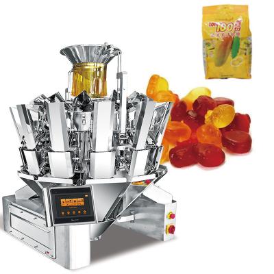 China Máquina automática de embalaje de bolsas de galletas de goma máquina de embalaje de azúcar de galletas de goma con pesadora de múltiples cabezas en venta