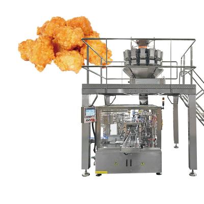 China Automatische vorgefertigte gebratene Hühnerflügel Reiskuchen Verpackungsmaschine Knödel Popcorn Hühnerverpackungsmaschine zu verkaufen