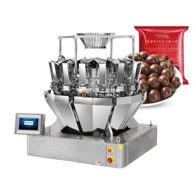 China Máquina automática de enchimento de grânulos de garrafas de chocolate misturadas de plástico Máquina de enchimento de doces duros de bola de chocolate à venda