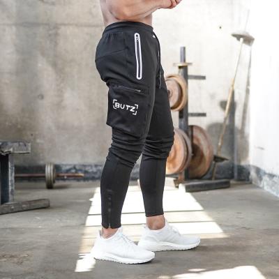 China Breathable Europe And USA Sports Suits Casual Mens Camouflage Fitness Pants Running Wholesale Training Pants Clothing for sale