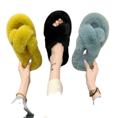 China Fashion Trend Women's Faux Fur Slippers Cross Fuzzy Slippers For Women Winter Bedroom Slippers for sale