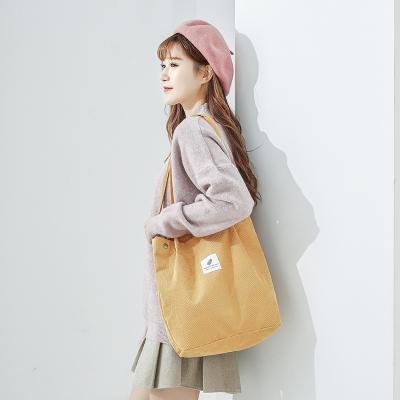 China 100% eco-friendly wholesale korean corduroy four-button canvas bags for ladies for sale