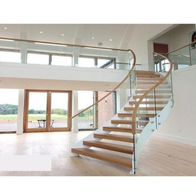 China Modern Modern Curved Staircase With Glass Railing And American Red Oak Treads Indoor Use Arc Staircase for sale