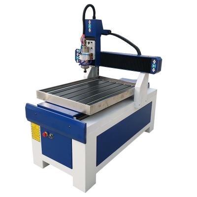 China Metal processing industry Table mobile 6090 metal engraving machine stone engraving machine metal relief punching machine good equipment in China for sale