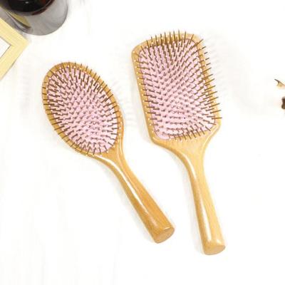 China Quality Nondisposable Fine Popular Wooden Paddle Detangling Hair Brush for sale