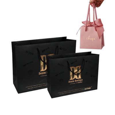 China Recyclable Custom Logo Printed Black Luxury Branded Retail Shopping Carry Out Boutique Gift Packaging Paper Bags for sale