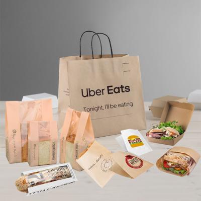 China Low Cost Recyclable Brown Bread Kraft Paper Bag Customize Logo Recycle Twisted Handles Manufacturer Shopping GIift for sale