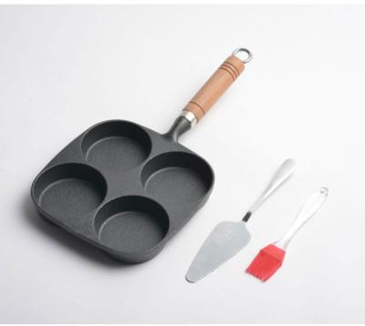 China Factory Price Cast Iron Omelette Pan Omelette Pan 4-Hole Eclectic Omelet Pan for sale