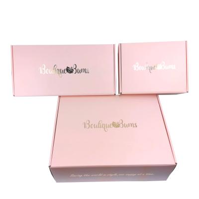 China Recyclable Luxury Pink Color Courier Custom Logo Paper Box Corrugated Cosmetic Shipping Cardboard for sale