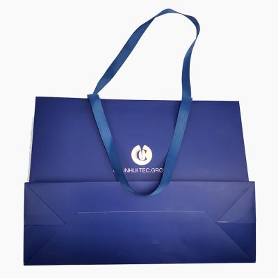 China Factory Price Recyclable Custom Logo Navy Blue Art Cosmetic Packaging Paper Bag for sale